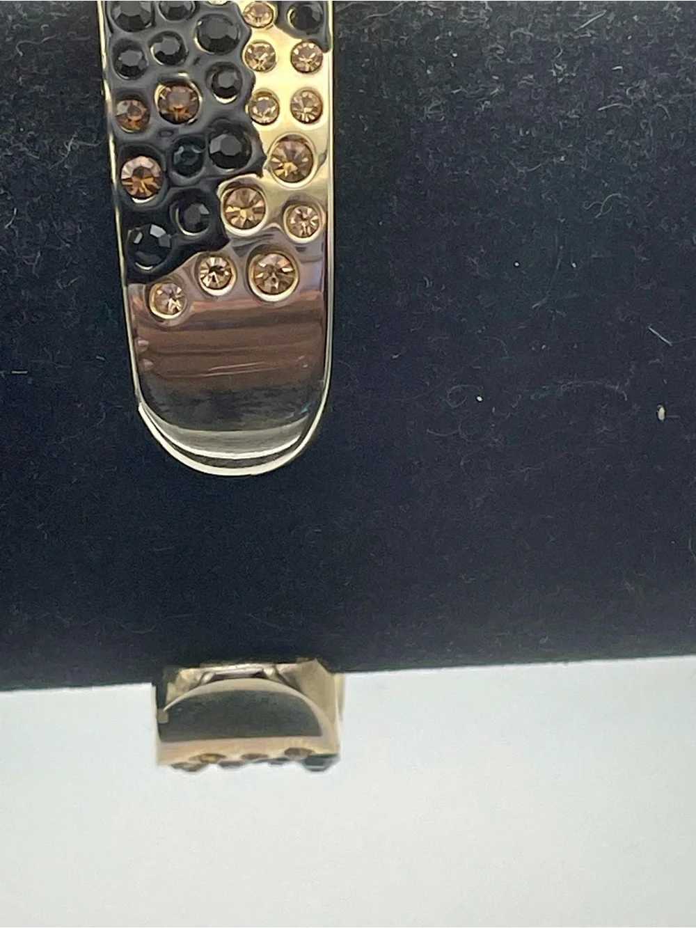 Gossip Gold-Tone Black and Champagne Crystal Bangle Watch. In original box.